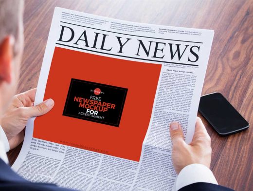 Newspaper Front Page In Hand PSD Mockup